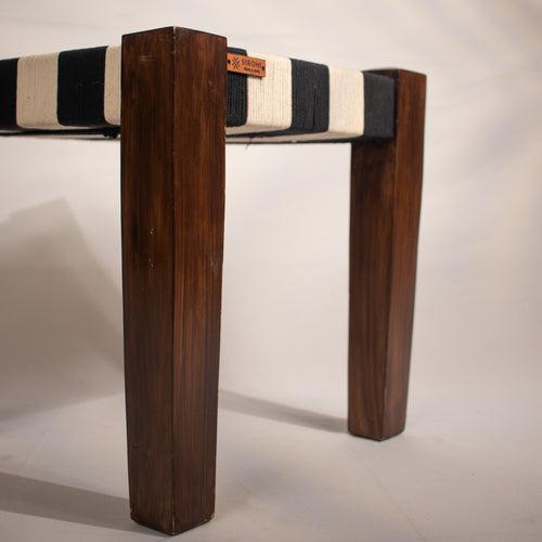 Black and white wooden stool