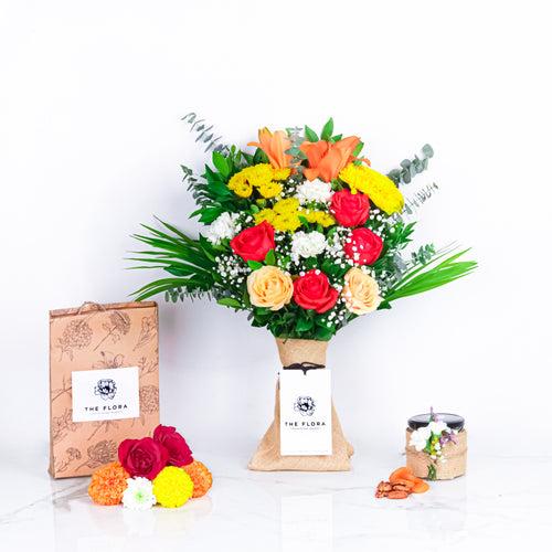 Diwali Floral Feast (Bouquet with Puja flowers, Dried Apricots & Pecan nuts)