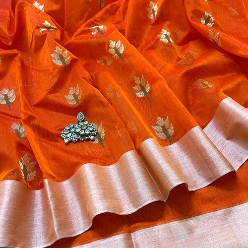 Orange Chanderi saree with flower motifs all over