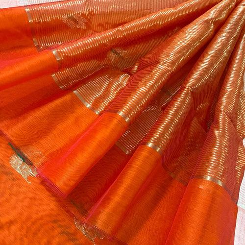 Orange Chanderi saree with flower motifs all over