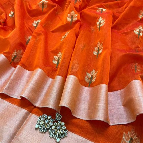 Orange Chanderi saree with flower motifs all over