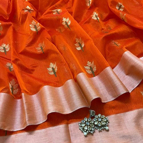 Orange Chanderi saree with flower motifs all over