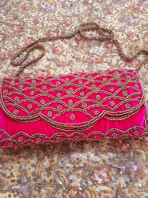 Pink embellished velvet purse