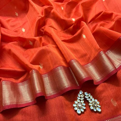 Rust and red maheshwari saree with flower bootis all over