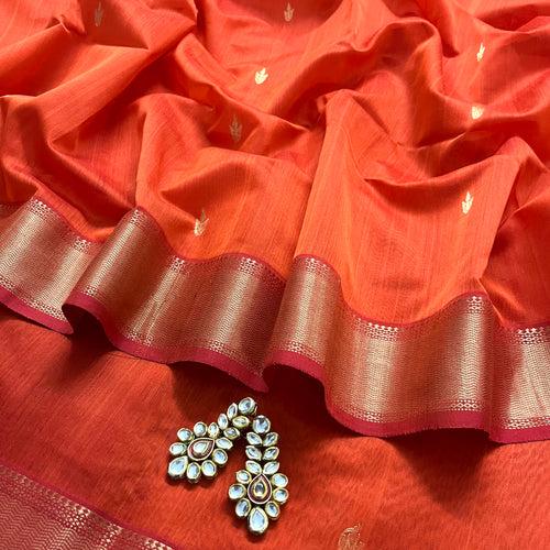 Rust and red maheshwari saree with flower bootis all over