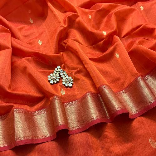 Rust and red maheshwari saree with flower bootis all over