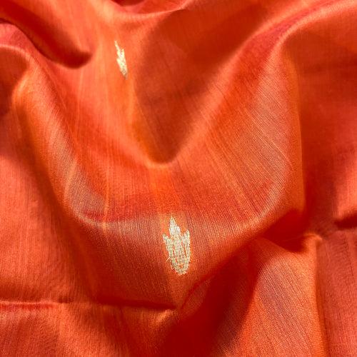 Rust and red maheshwari saree with flower bootis all over