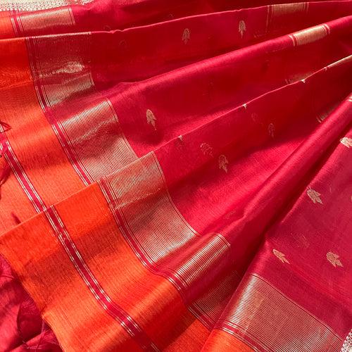 Rust and red maheshwari saree with flower bootis all over