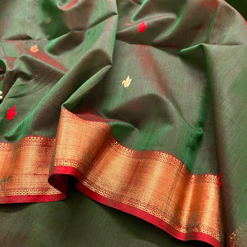 Dark green and red maheshwari saree with flower bootis all over