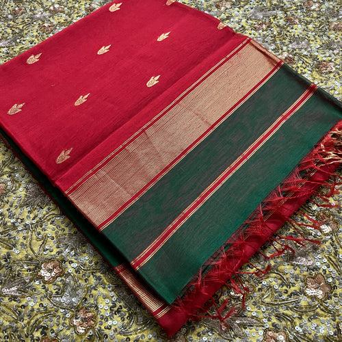 Dark green and red maheshwari saree with flower bootis all over