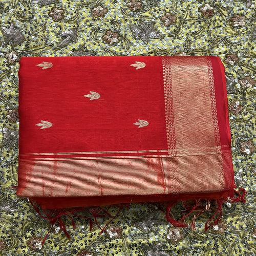 Rust and red maheshwari saree with flower bootis all over