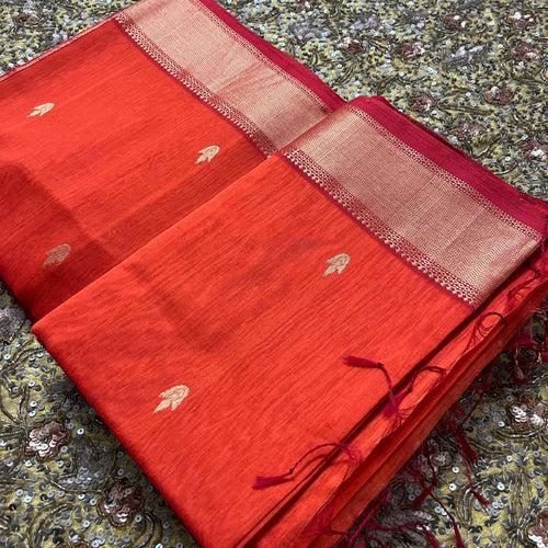 Rust and red maheshwari saree with flower bootis all over