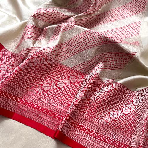 Sand beige and red banarasi silk saree with zari work all over