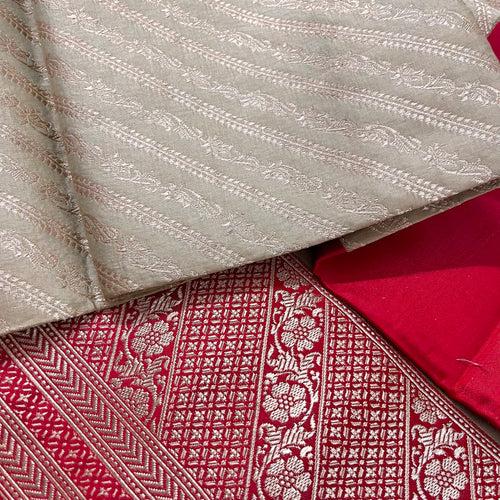 Sand beige and red banarasi silk saree with zari work all over