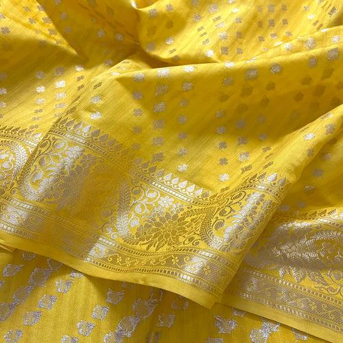 Yellow Banarasi silk saree with zari work all over