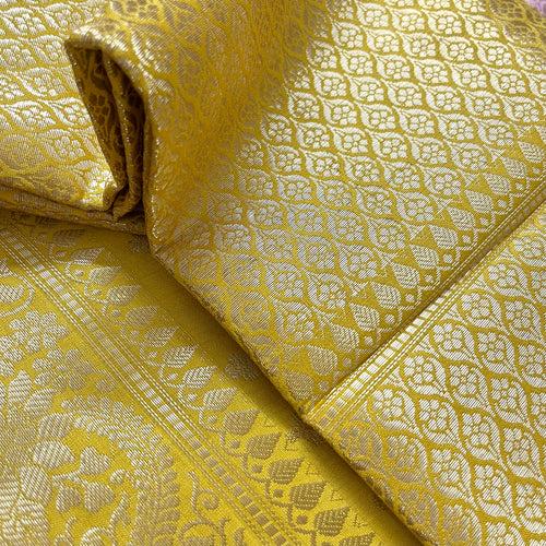 Yellow Banarasi silk saree with zari work all over