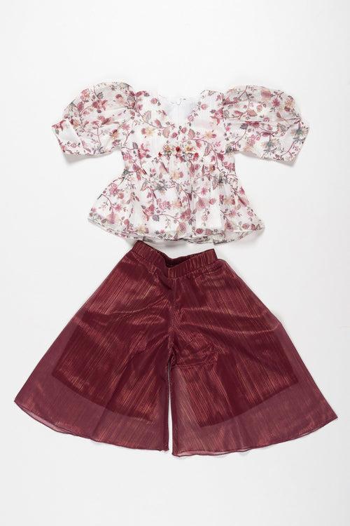 Blossom Chic: Floral Peplum Top and Textured Culotte Set for Girls