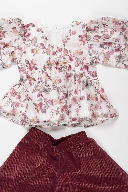 Blossom Chic: Floral Peplum Top and Textured Culotte Set for Girls