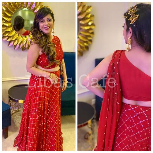 Client In Red Drape Lehenga