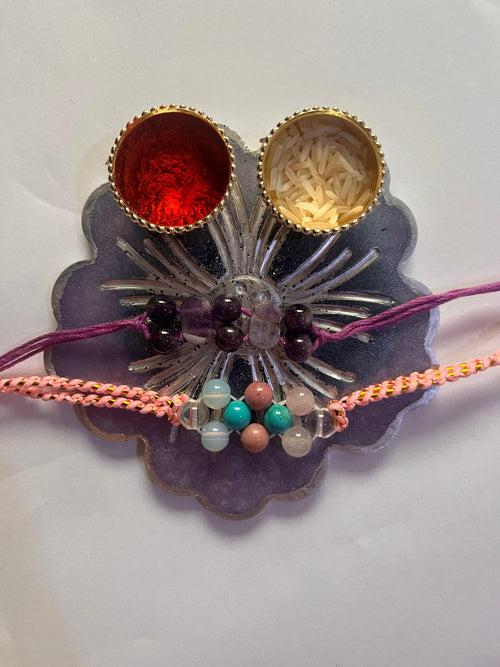 Customized Purple  flower shape Rakhi Pooja Thalli with Rakhi