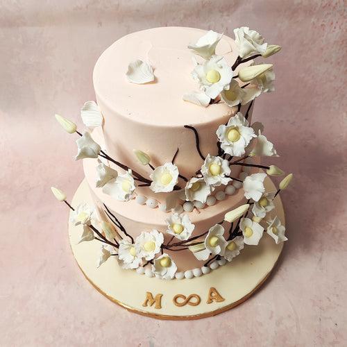 Two Tier White Flower Cake