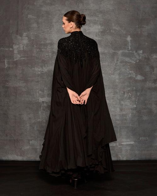 Black kaftan dress with silver zardozi embroidery.