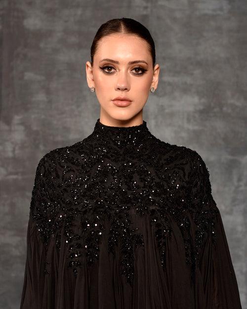 Black kaftan dress with silver zardozi embroidery.