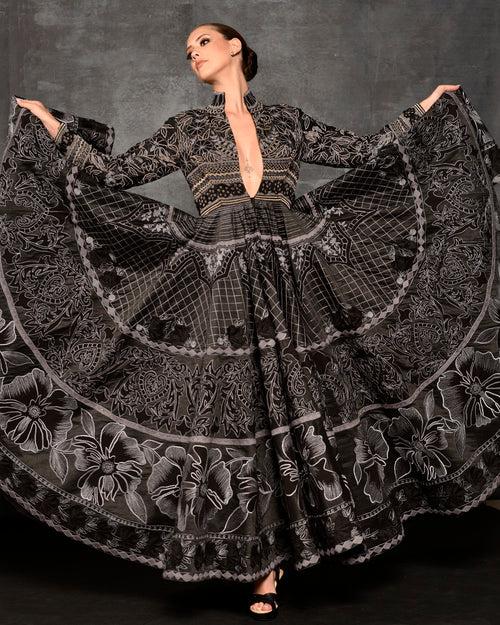 Black gown adorned with silk thread embroidery