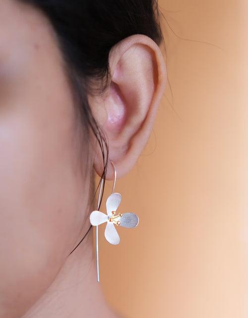 Silver floral earrings with gold tipped buds