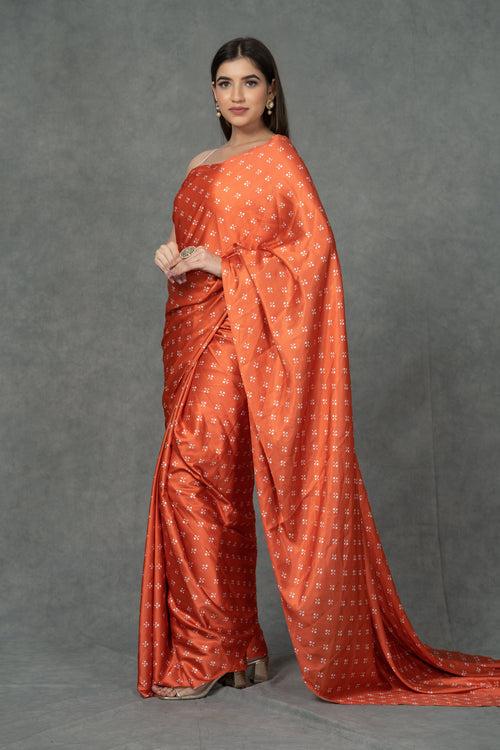 Orange Satin saree with printed florals