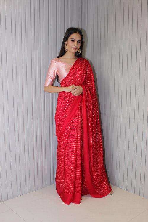 Red chinnon saree with embellishments