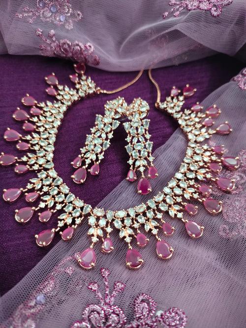 N01153_Grand Lovely designer Rose Gold & Metallic polished choker necklace embellished with American diamond stones with delicate Ruby Pink/ Purple  Stones work.