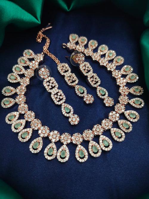 N01173_Grand Lovely designer Rose Gold polished Necklace Set  embellished with American diamond stones with delicate Mint Green Stones .