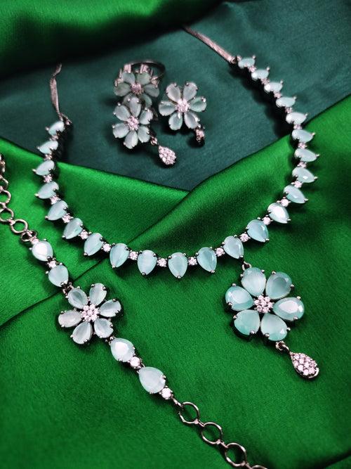 N01162_Grand Lovely designer Silver polished choker Necklace Set+Ring+Bracelet embellished with American diamond stones with delicate Rama Green Stones work.