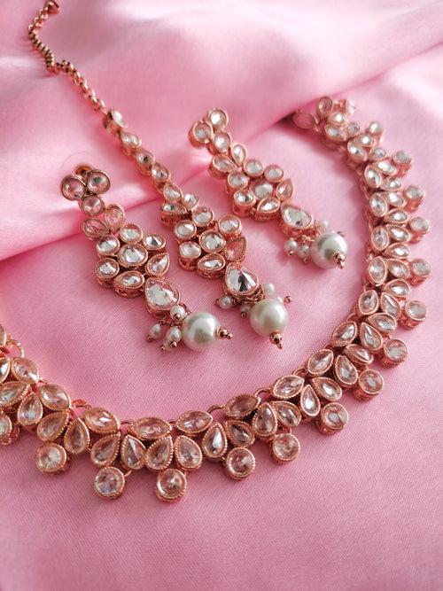 N01192_Grand Lovely designer Rose Gold polished Necklace Set  embellished with American diamond stones with delicate White Stones .