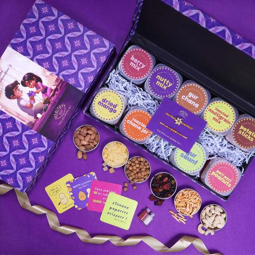 Rakhi Munch n' Crunch Gift Box Rakhi Gift Hamper | Pack of 9 snacks, 1 Pair Rakhi, 1 Roli chawal, 4 Stickers