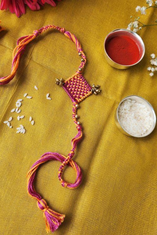 Miharu Handmade Weaving Orange-Pink Rakhi