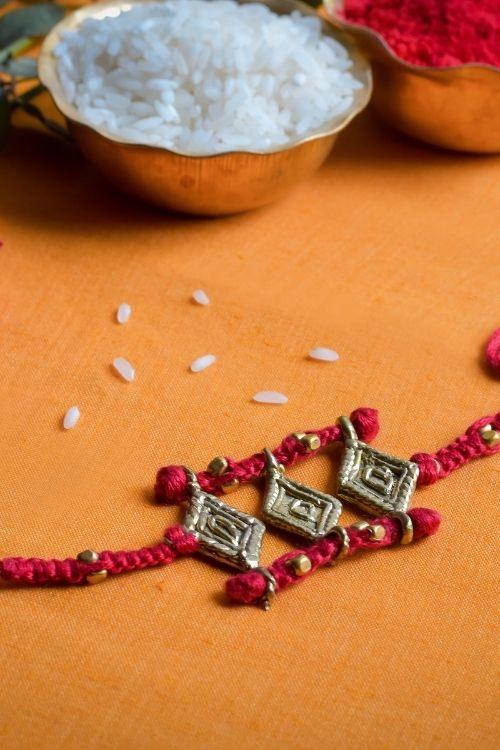 Miharu Handmade Dokra Red Thread Rakhi (RH011)