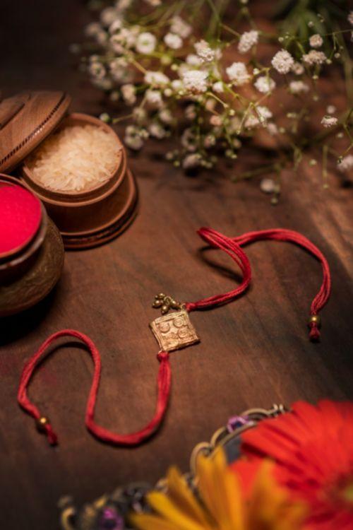 Miharu Handmade Light Red Dokra Square Rakhi