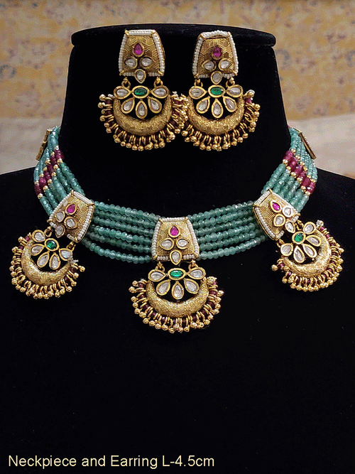 Five jade strings three antique gold kundan tukdies necklace set