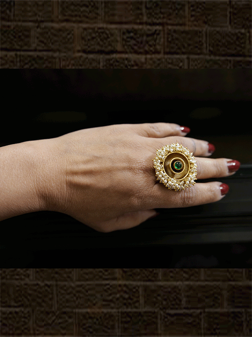 Antique gold finish adjustable ring with beaded lace on edge and stone in the middle