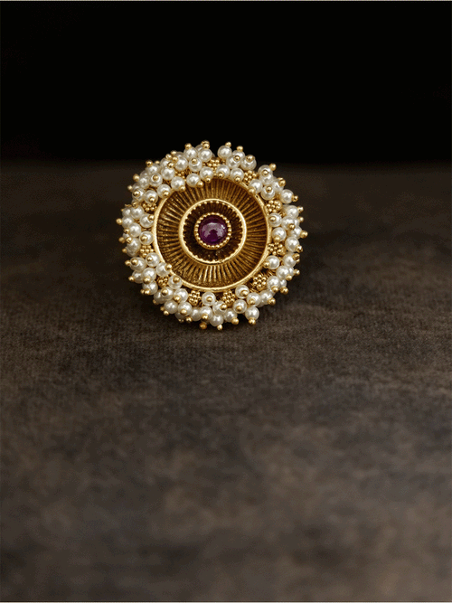 Antique gold finish adjustable ring with beaded lace on edge and stone in the middle