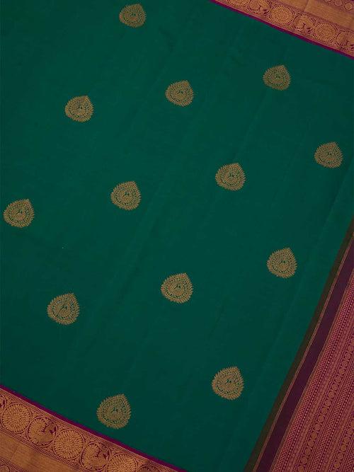 The Classic Silk Saree in Parakeet green and Byzantine Purple Border