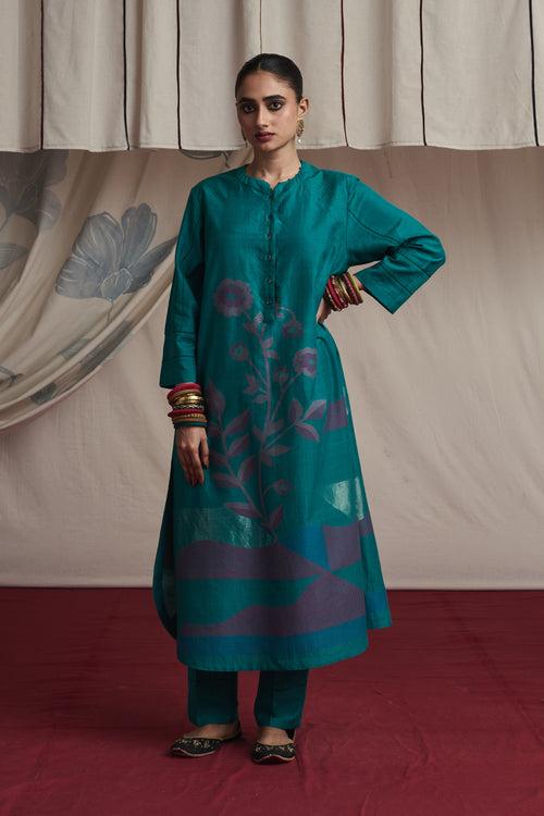 Torquoise hand woven silk and khadi cotton jamdani Harleen kurta set.