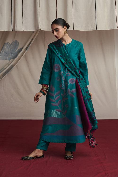 Torquoise hand woven silk and khadi cotton jamdani Harleen kurta set.