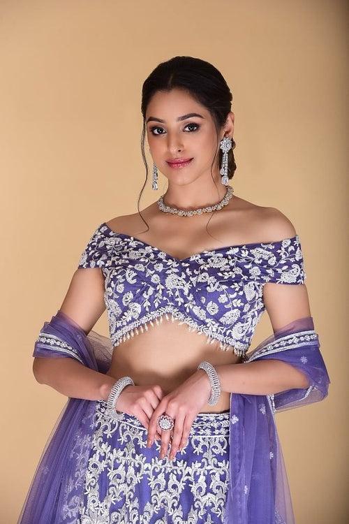 Light violet embroidered Lehenga set.