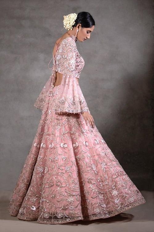 Soft pink peplum Lehenga set.