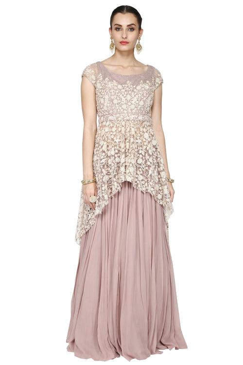Pale pink tunic and long skirt set.