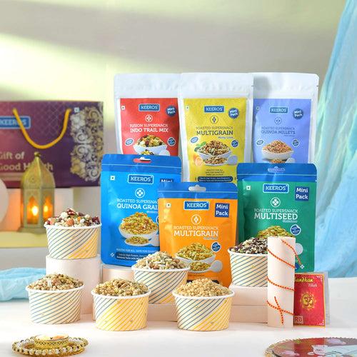 Keeros Healthy Bhai Dooj Gift Hamper with Roli Chandan Tikka Chawal Mishri Pack : Combo of Sweet & Salted, Tasty & Nutritious Snacks in a Classy Premium Gift Box | 6 Varieties of Healthy Snack Pouches of 33g to 50g