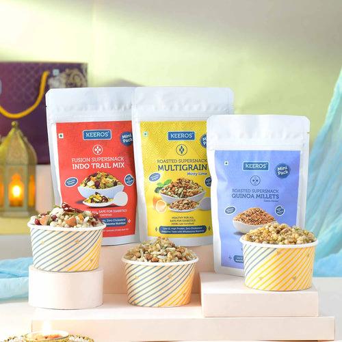 Keeros Healthy Bhai Dooj Gift Hamper with Roli Chandan Tikka Chawal Mishri Pack : Combo of Sweet & Salted, Tasty & Nutritious Snacks in a Classy Premium Gift Box | 6 Varieties of Healthy Snack Pouches of 33g to 50g